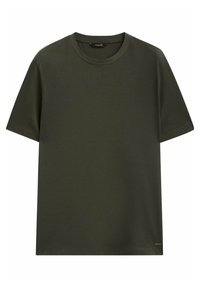 Oliwkowy t-shirt z krótkim rękawem wykonany z miękkiej bawełny. Posiada okrągły dekolt i luźny krój. Minimalistyczny design bez wzorów.