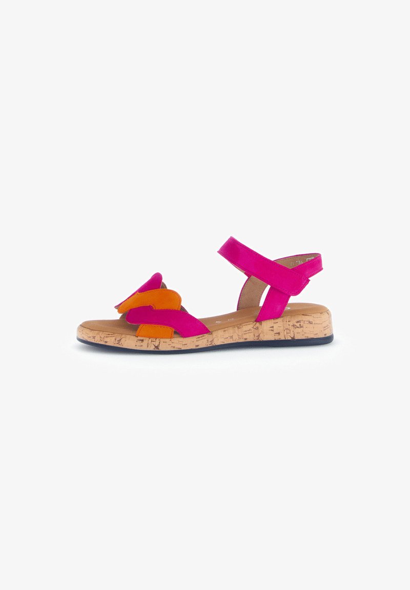 Pink and orange sandal featuring cork sole and two front fabric straps, one pink and one orange, with an adjustable ankle strap.