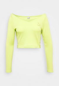Długi rękaw, krótki top w jasnym neonowym zielonym kolorze z prążkowanej tkaniny, z dekoltem w kształcie litery V i małym logo na piersi. Gładka faktura.