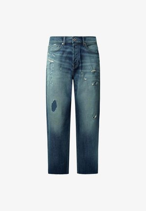 Sinised pesu teksad, millel on kulunud viimistlus, kahjustatud detailid, nähtavad plaastrid, sirge lõige ja rebenditega äär.