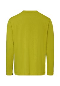 Chemise à manches longues vert citron uni vue de dos, avec un col rond et des détails de couture simples.