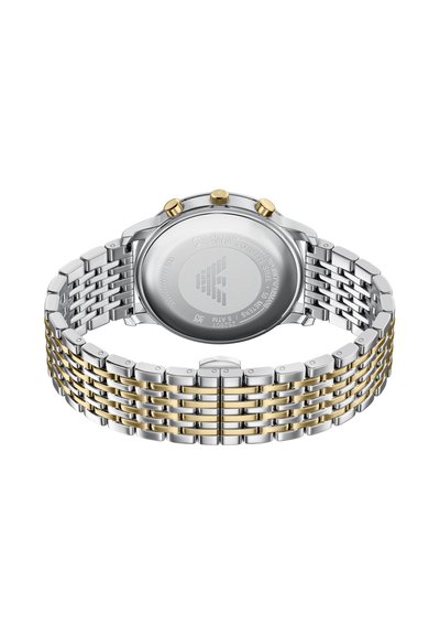 Edelstahluhr mit einem zweifarbigen Armband in Silber und Gold. Verfügt über drei Knöpfe und einen runden Gehäuseboden mit eingravierten Details.