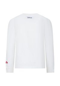 Witte langemouwen shirt met ronde hals. Voorzien van het 'Disney' logo in het blauw op de achterkant en rode geborduurde details op de linker mouw.