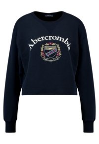 Sudadera corta azul marina en mezcla de algodón, con un escudo bordado y el texto "Abercrombie". Puños de canalé, diseño de cuello redondo.
