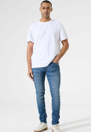 ROCKO - Slim fit jeans - medium used