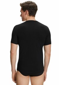 Black short-sleeved t-shirt with a fitted design, made from soft fabric, featuring a classic crew neckline and smooth texture.
