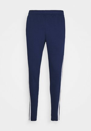 SQUAD - Tracksuit bottoms - team navy blue