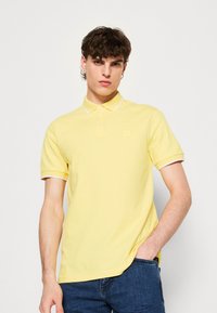 BOSS PASSERTIP - Polo - bright yellow