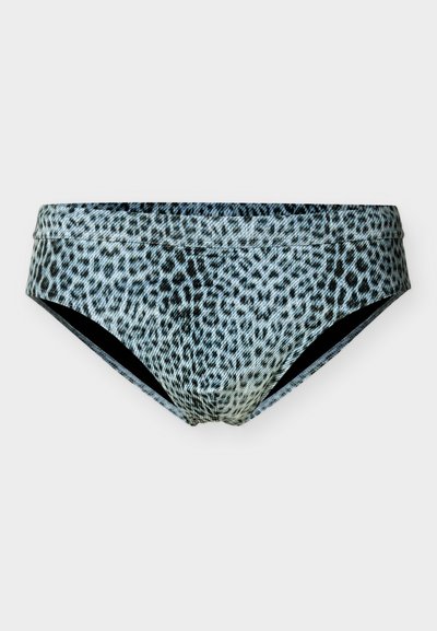 Γυναικεία μπικίνι με μοτίβο λεοπάρ σε μαύρο και λευκό χρώμα σε απλό λευκό φόντο.