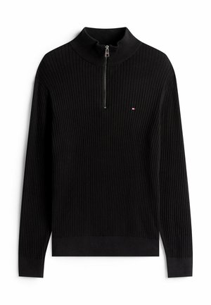 Czarny sweter z prążkowanej dzianiny z wysokim kołnierzem i półkowym zamkiem. Posiada małe logo na piersi. Długie rękawy z prążkowanymi mankietami.
