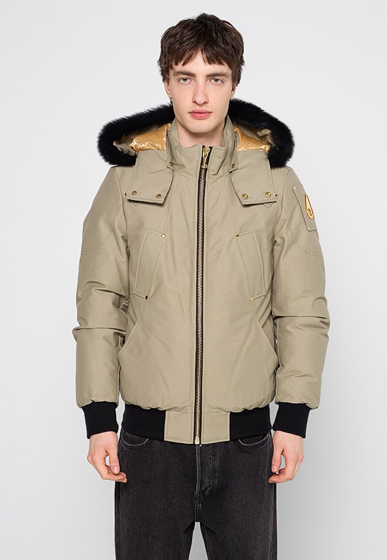 Moose Knuckles Gewatteerde jas zandkleur Moose Knuckles Gewatteerde jas zandkleur