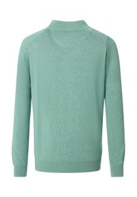 Jasnozielony sweter dzianinowy, z okrągłym dekoltem, długimi rękawami, prążkowanymi mankietami i dołem, gładka faktura oraz subtelny melaninowy wzór.