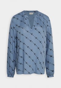 Camisa de manga longa azul clara com decote em V e padrão floral preto. Apresenta um corte solto e punhos franzidos. Tecido suave e leve.