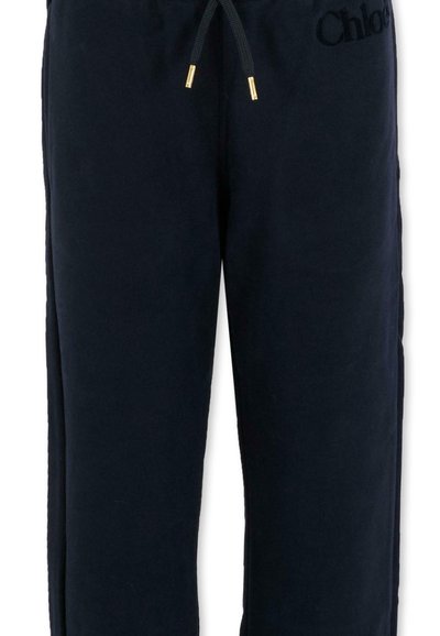 Marineblauwe sweatpants van zacht katoen, met een trekkoord in de taille, zijzakken en geborduurd logo. Glad textiel met een relaxte pasvorm.