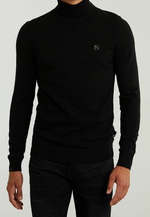 Sort turtleneck sweater lavet af strikket stof, med ribbede skulderdetaljer og et lille logo på brystet. Slim fit design.