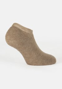 Calcetín de tobillo marrón claro mostrado sobre un fondo blanco, que muestra la textura de punto y el puño elástico.