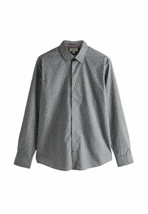 Košile s knoflíky ve světle modré barvě s květinovým vzorem v tmavší modré a šedé. Dlouhé rukávy, límec a uvolněný střih.