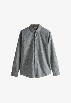 Világoskék gombos ing, sötétebb kék és szürke virágmintával. Hosszú ujjú, galléros és laza szabású.