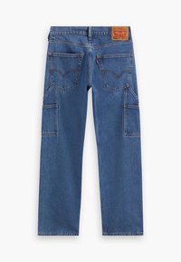 Blauwe denim jeans met een rechte snit, kenmerkende achterzakken en versterkte zijzakken. Voorzien van een leren merkpatch op de achterkant van de taille.