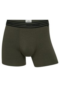 Olivengrønne bomulds boxer shorts med en sort stribet elastik. Har en frontlomme og en glat tekstur. Minimalistisk design.