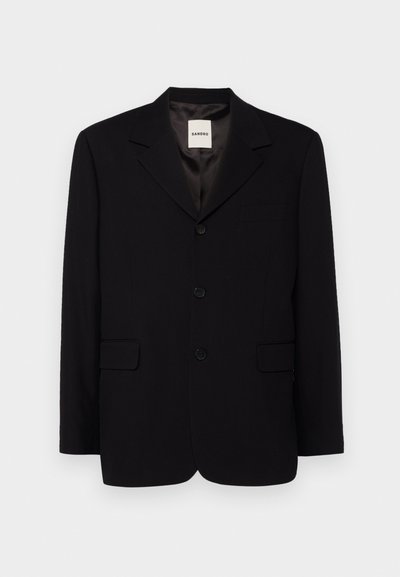 Schwarzes Blazer mit Reverskragen, Drei-Knopf-Verschluss, einer Brusttasche und zwei Fronttaschen. Glattes Gewebe und strukturiertes Design.