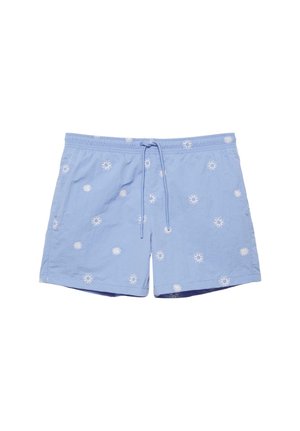 Short de bain bleu clair avec des motifs blancs en forme de soleil, taille élastique et cordon à l'avant, posé à plat sur un fond blanc.