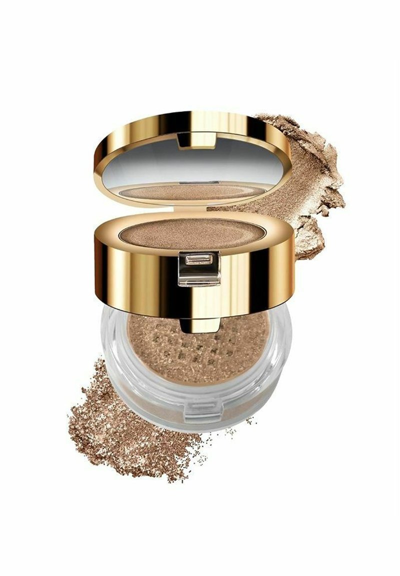 Bronze löspuderfoundation i en genomskinlig behållare med ett guldock. Fina gnistor synliga, med lite puder spritt runt basen.