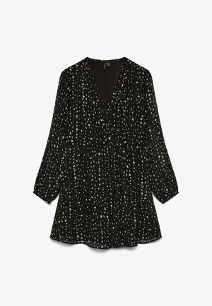 Musta pitkähihainen kietaisumekko, jossa valkoinen epäsäännöllinen pistereunus, V-pääntie ja hieman liehuva hame.