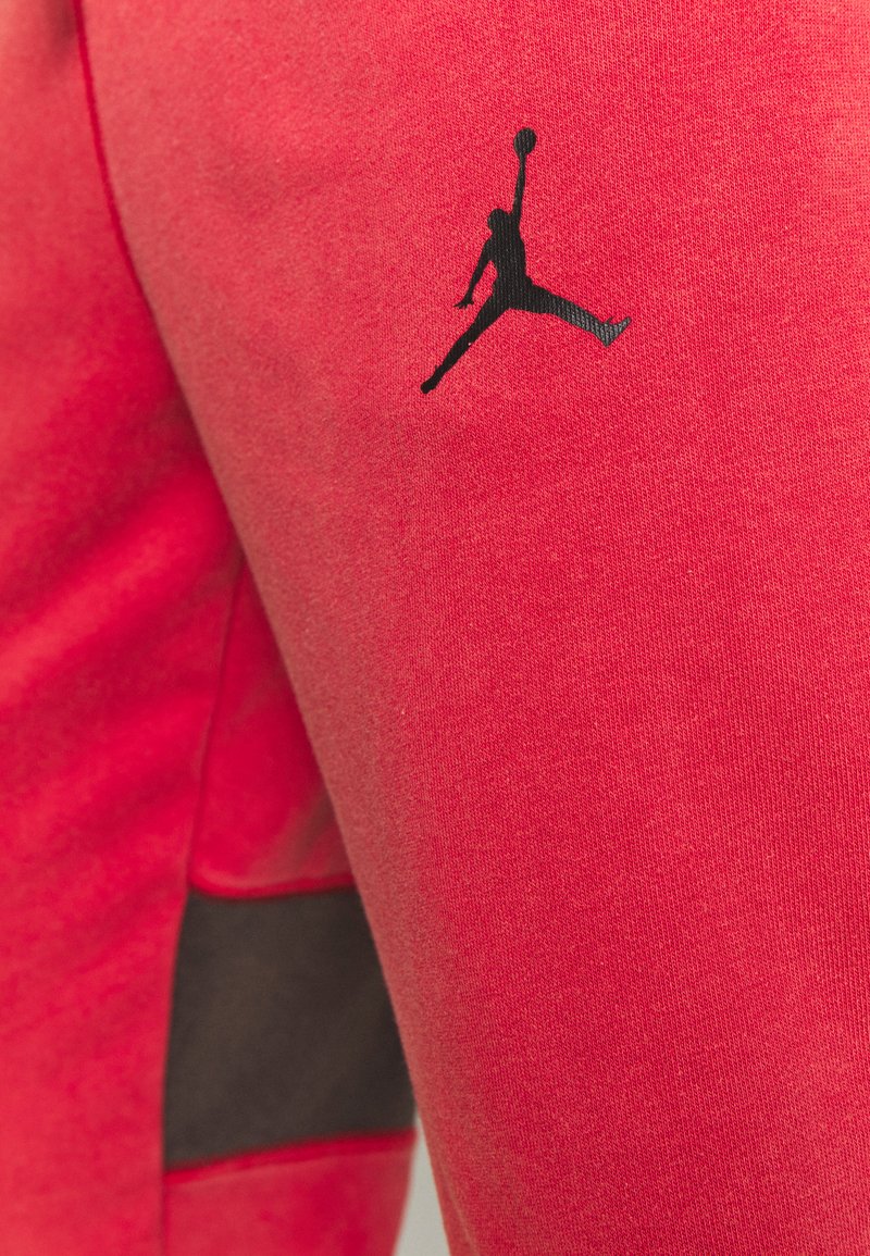 Herren Trainingsanzüge | Jordan AIR PANT Jogginghose gym red/black/rot - SU82508 Herren Trainingsanzüge | Jordan AIR PANT Jogginghose gym red/black/rot - SU82508