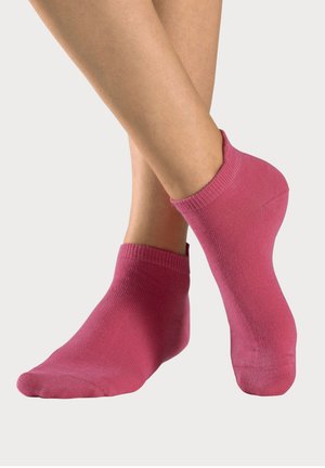 Rosa Knöchelstrümpfe mit einem gerippten Bündchen, aus einem weichen, dehnbaren Material gefertigt. Glatte Oberfläche mit nahtloser Verarbeitung und abgerundetem Zehendesign.