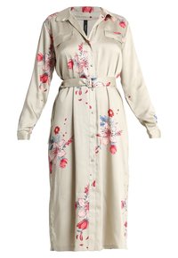 Vestito button-up beige chiaro con maniche lunghe, stampa floreale in rosa e blu. Vita cintata, tessuto morbido, due tasche sul petto e taglio dritto.