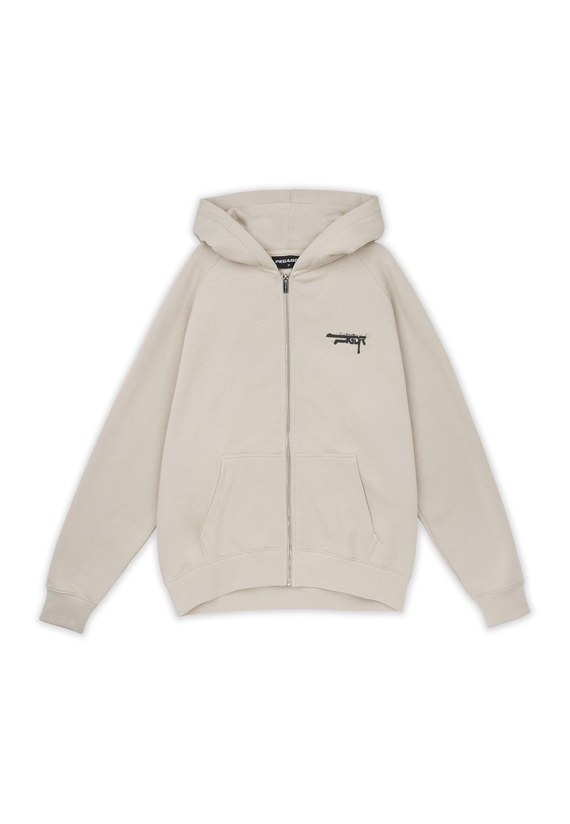 Beige Zip-Up-Hoodie mit Kängurutasche, verstellbarem Kordelzug an der Kapuze und einem schwarzen Grafikdesign mit einer Waffe auf der linken Brust.