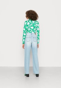 ONLY ONLMOLLYHW WIDE  - Calças de ganga de corte relaxado - light blue denim