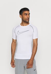 Nike Performance - Camiseta deportiva - white/black Imagen en miniatura 1