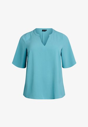 Blouse turquoise à manches courtes avec un col en V et un ourlet droit. Texture lisse, tissu léger avec un détail de motif subtil.