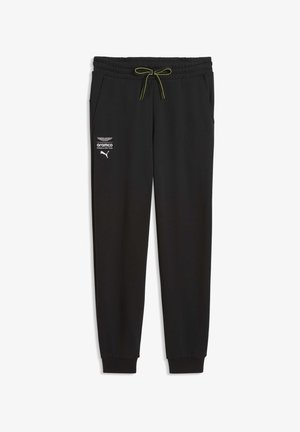 Fekete, puha anyagból készült jogger nadrágok, sárga részletekkel díszített húzózsinórral, oldalzsebekkel és logónyomatokkal a bal combon.