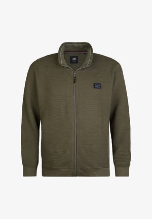 Olivenfarbene Jacke mit Reißverschluss und strukturiertem Wabenmuster, mit gerippten Bündchen und Kragen. Besitzt ein Markenpatch auf der Brust.