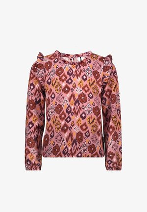 Różowy top z długim rękawem z geometrycznym kwiatowym wzorem w kolorach pomarańczowym, brązowym i białym. Projekt ozdobiony jest falbankami na ramionach.