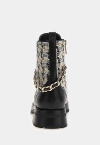Guess Bottines à lacets - black