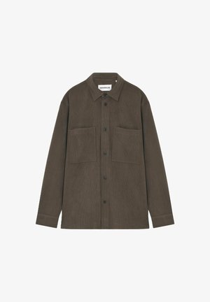 Bruin corduroy shirt jack met een kraag, lange mouwen, twee voorzakken en zwarte knopen. Textiele stof met zichtbare ribbels.