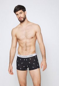 Boxeri negri din bumbac cu o talie albă inscripționată "POLO RALPH LAUREN", având un model repetat cu mici logo-uri de cai.