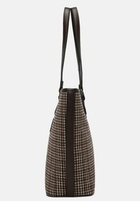 Torba na ramię w kratkę houndstooth w brązowo-beżowym materiale, uzupełniona ciemnobrązowymi skórzanymi paskami i akcentami po bokach.