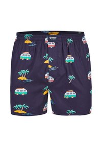 Short bleu marine avec motif tropical comprenant des palmiers, de petites îles, des vagues océaniques et des vans colorés. Taille élastique avec étiquette de marque.
