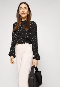 Modström GALE PANTS - Calças - bella rose