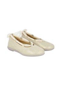 Bailarinas beige brillantes con una textura suave y lisa, punta redondeada y un lazo decorativo en el talón, con una suela de goma flexible.