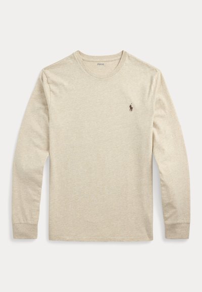 Beige long-sleeve crew neck shirt with a small Polo brand logo embroidered on the left chest.