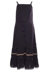 Svart ärmlös klänning med dragsko i midjan, fransdetaljer och dekorativa sydda detaljer på den lagerade kjolen.