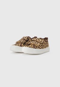 Leopard print canvas sneakers with brown accents, featuring two Velcro straps and a white rubber sole for added durability and grip.