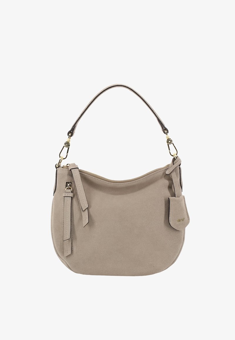 Beige Wildlederhandtasche mit geschwungener Form, einteiligem Schulterriemen, goldfarbenen Beschlägen und einem Quasten-Detail an der Seite.