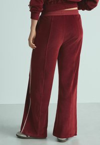 Next JOGGERS - Träningsbyxor - burgundy red